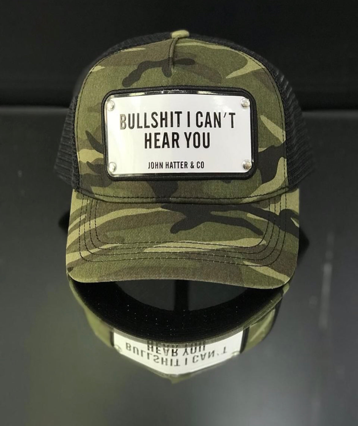 John hatter & Co metal plate trucker