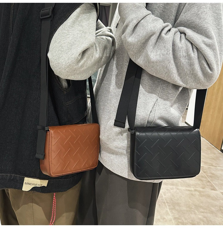 Embossed pattern side bag
