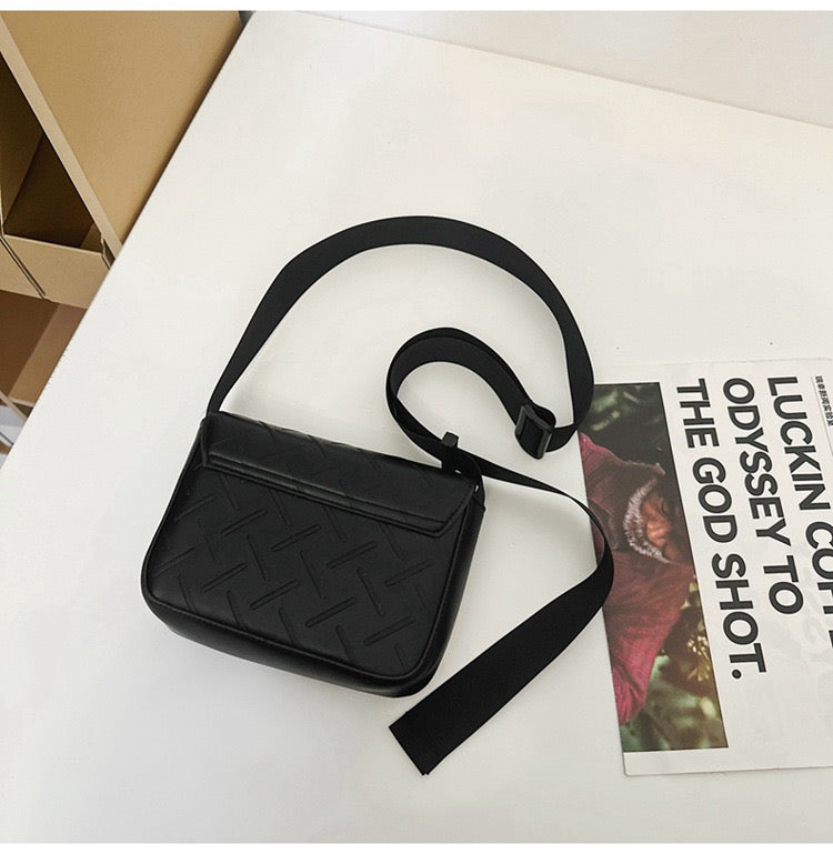 Embossed pattern side bag
