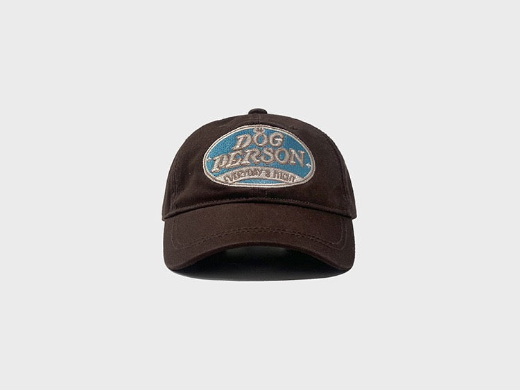 Dog person embroidered hat in brown
Size: Adjustable