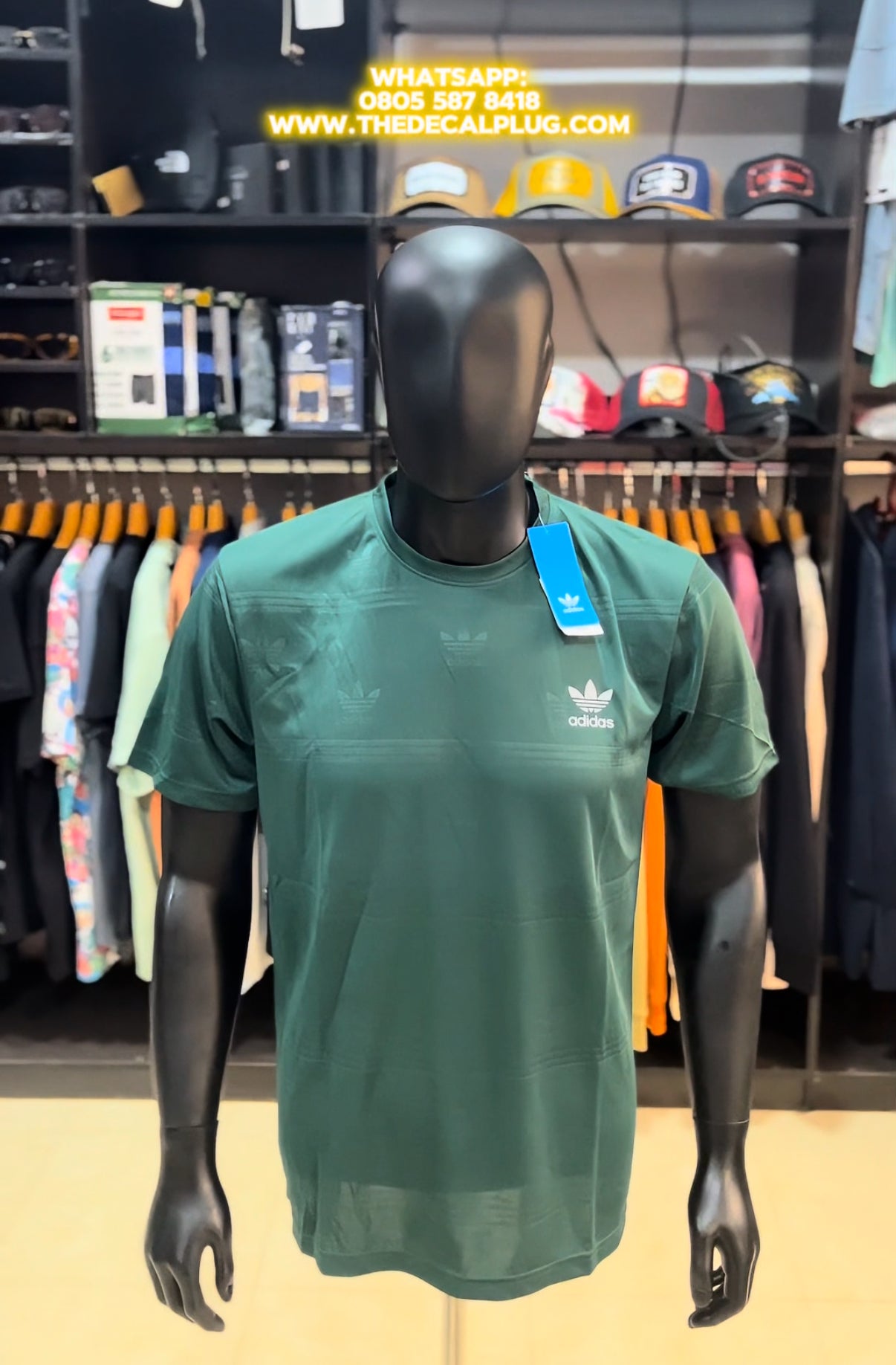 Adidas embossed logo sport top In green