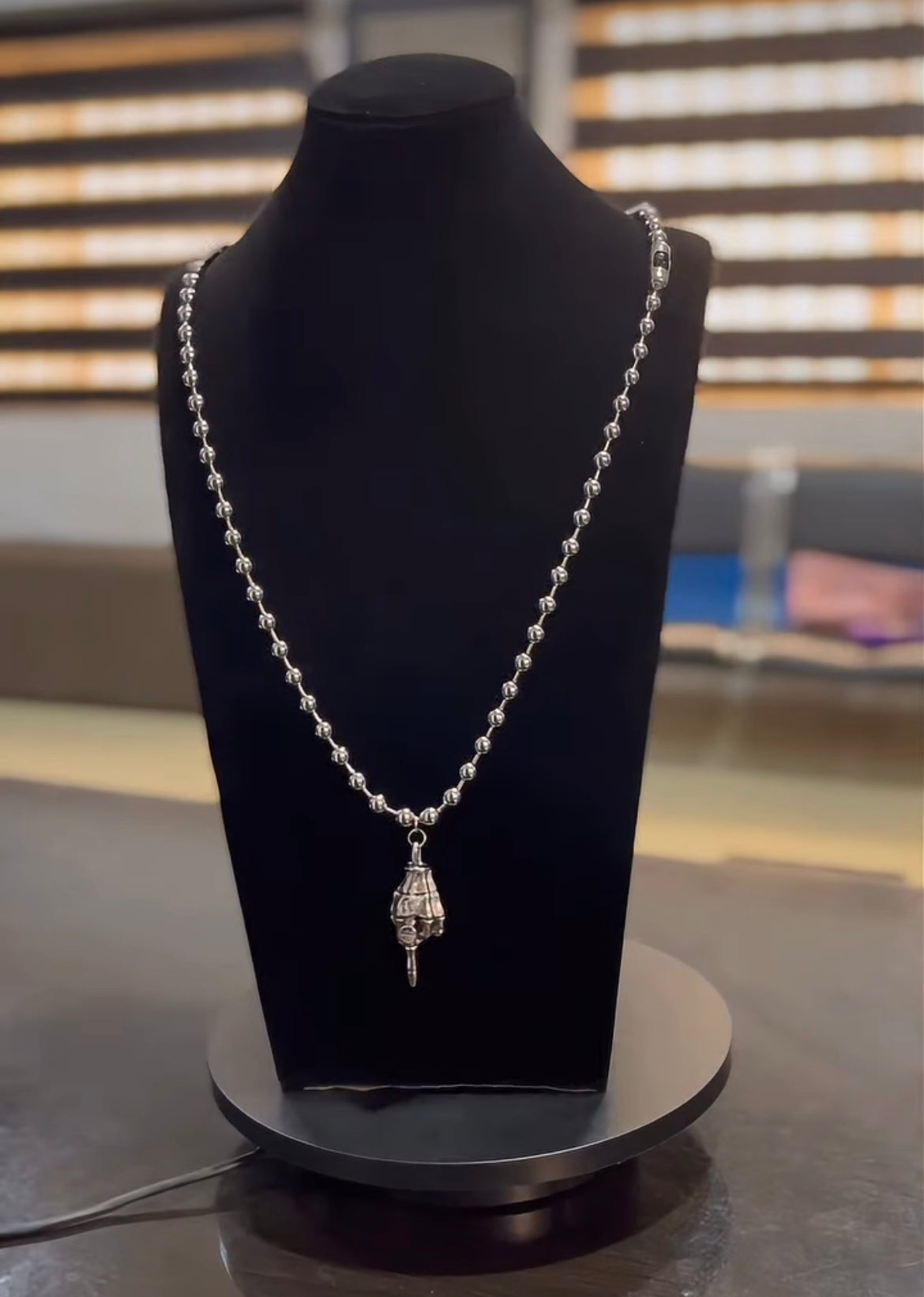 Finger steel beaded necklace