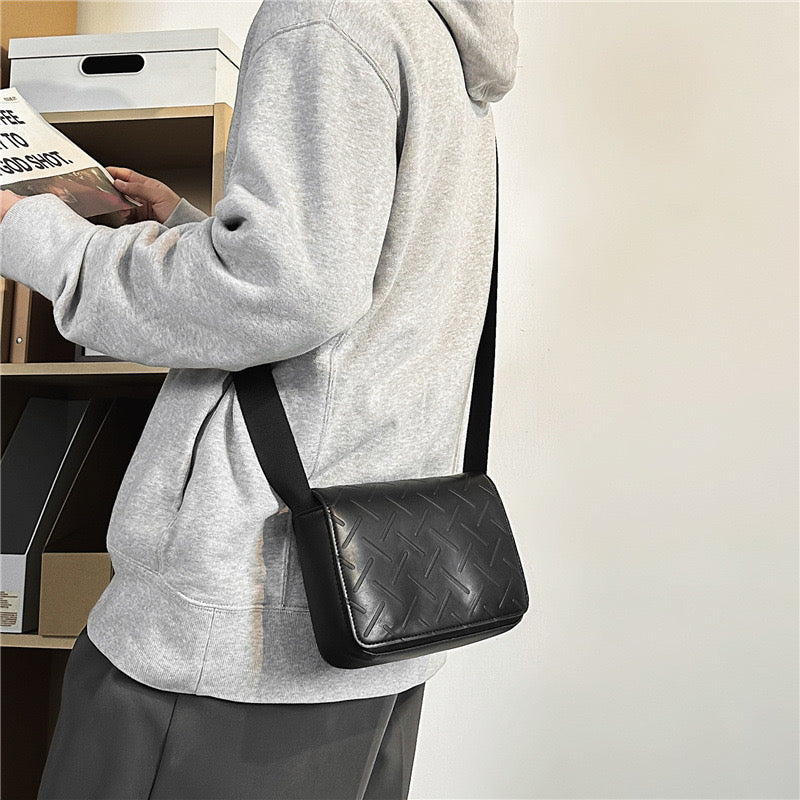 Embossed pattern side bag