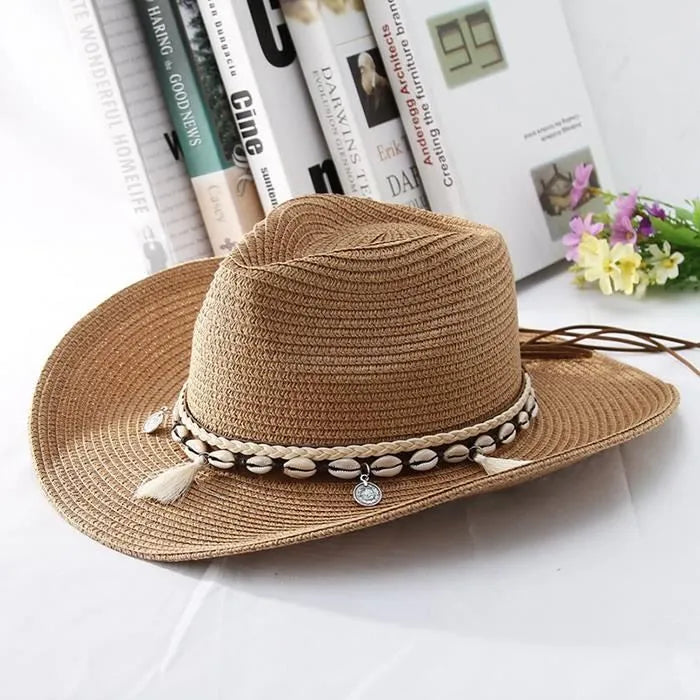 Cowrie adorned straw hat
Size: M