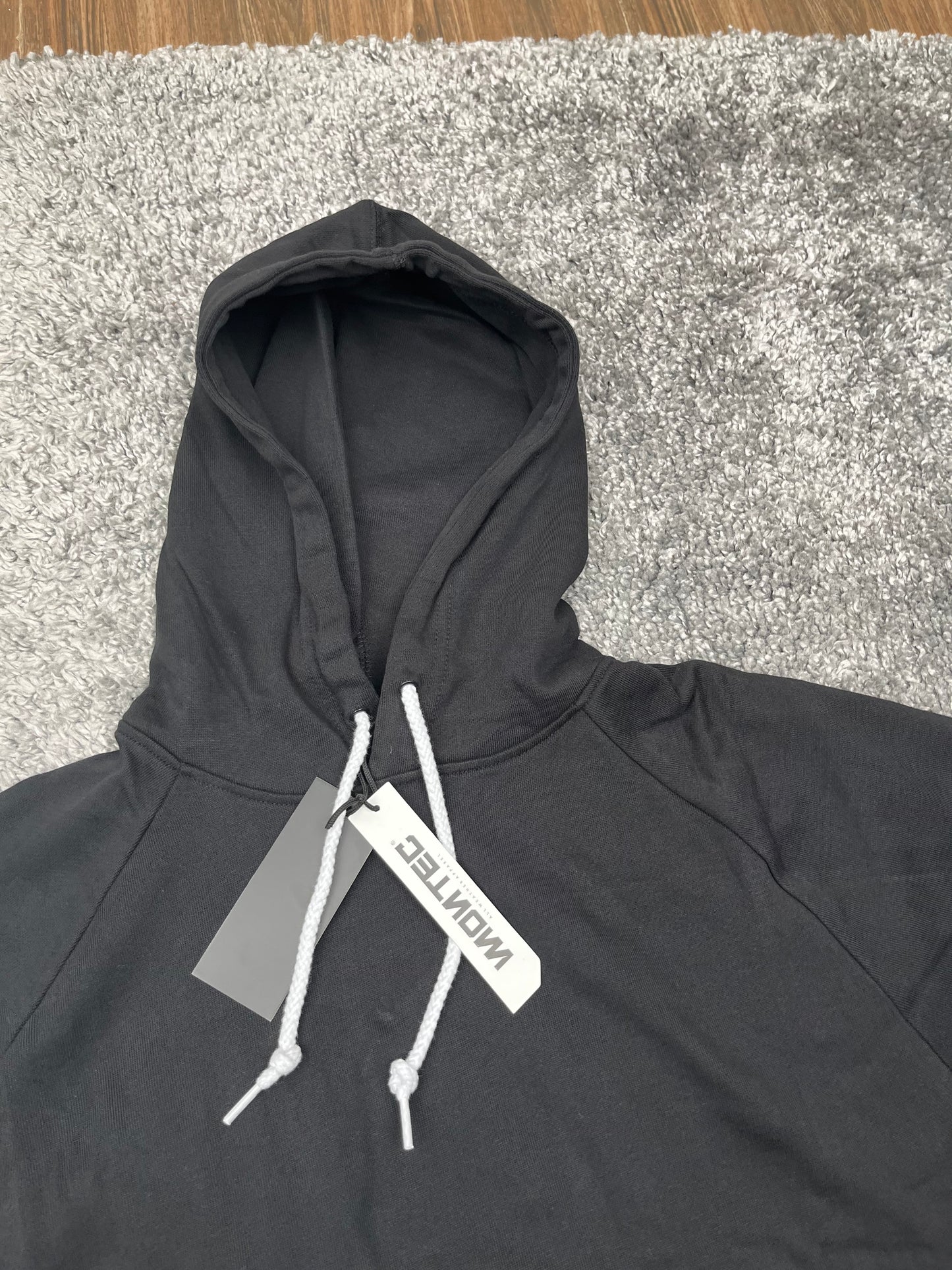 Montec hoodie in black with white lace
