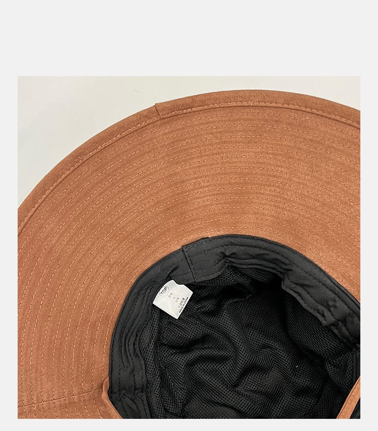 Criss cross textured bucket hat in brown