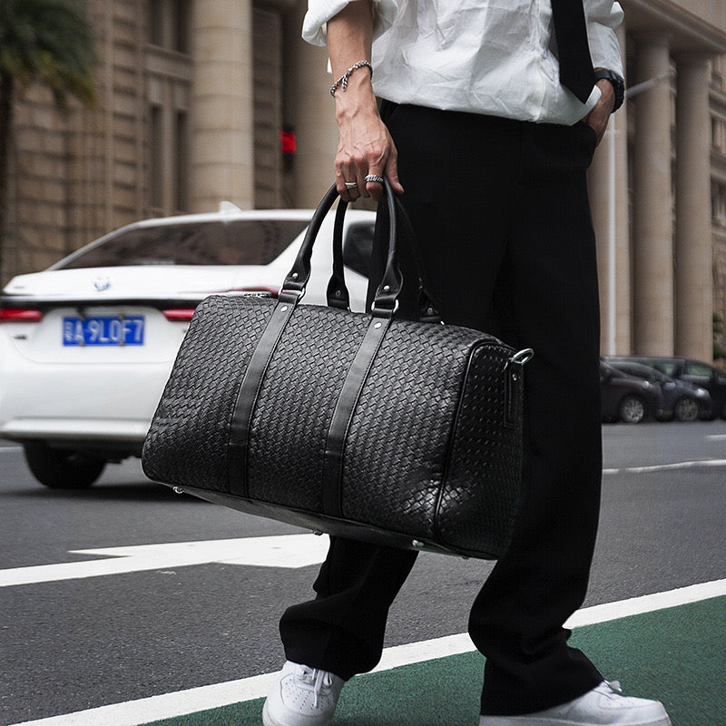 Woven leather mini duffel bag