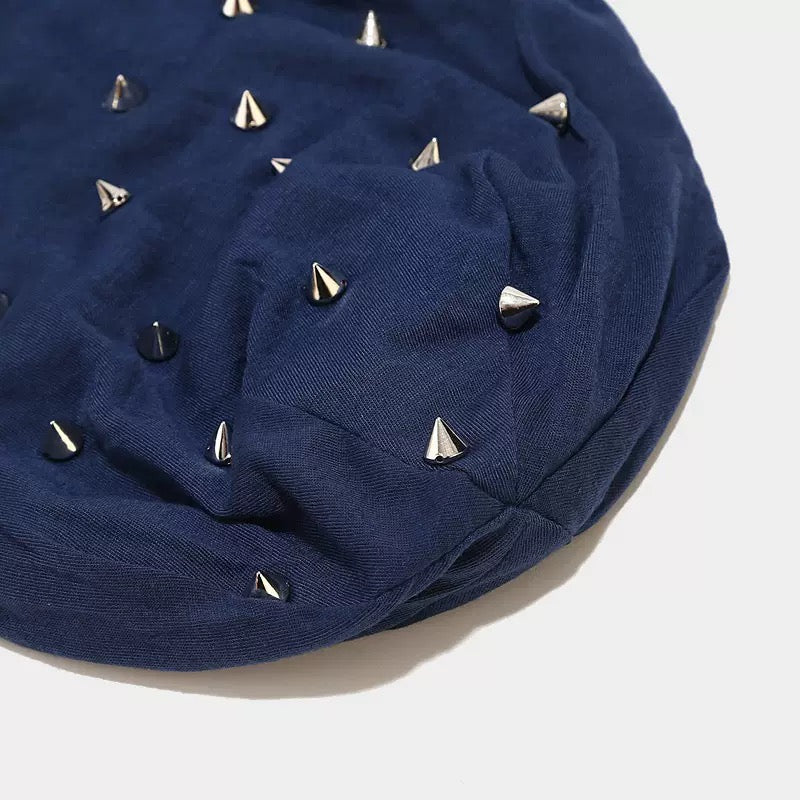 Studded skull cap