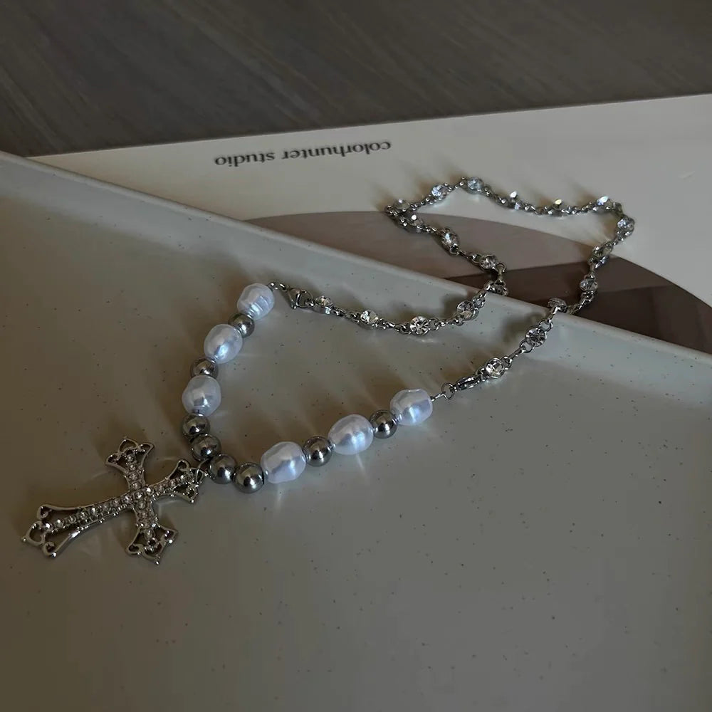 Pearl chain with crucifix pendant