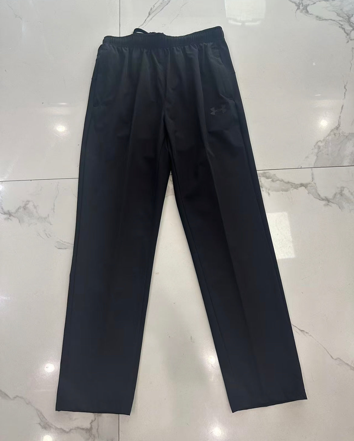 UA all black trackpant