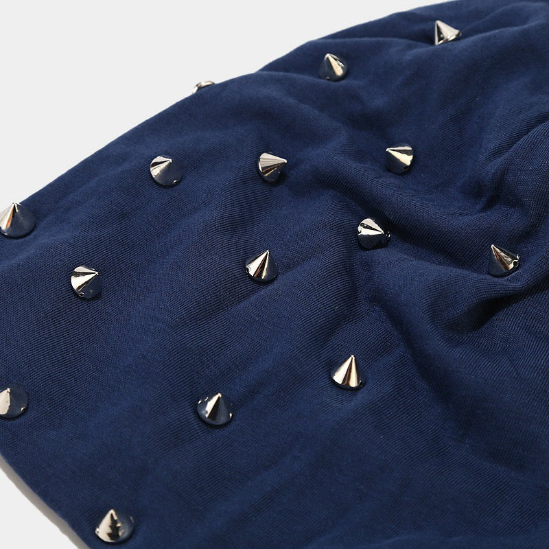 Studded skull cap