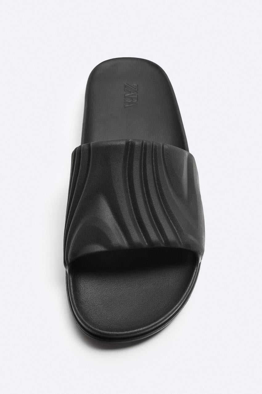 Zara textured monochrome slider