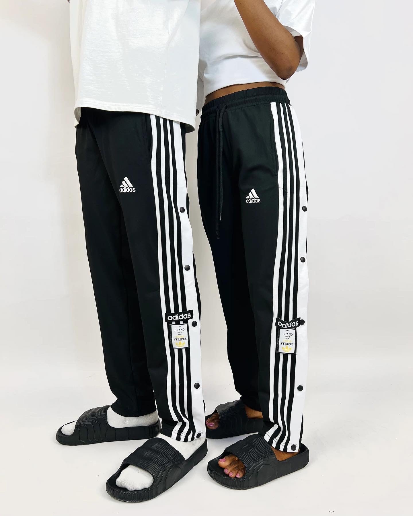 Adidas Unisex Tearaway jogger pants in black Tdp.ng